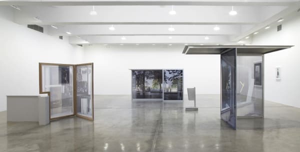 image of Hornig sculptures with transparent photographs