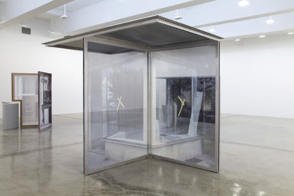 image of Hornig sculptures with transparent photographs