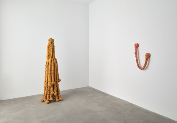 Ernesto Neto installation with crochet headdress