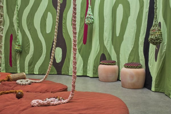 Ernesto Neto installation with instruments, hanging crochet