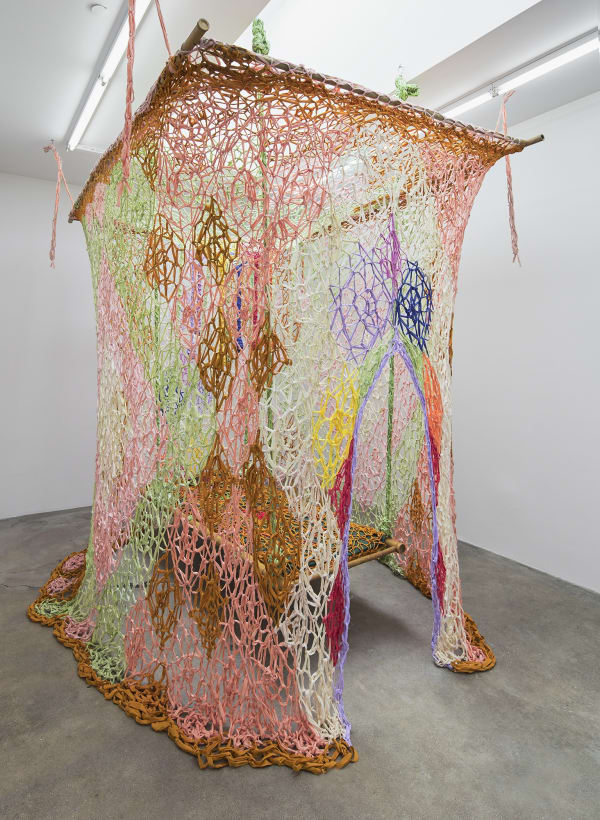 Ernesto Neto installation with healing bed
