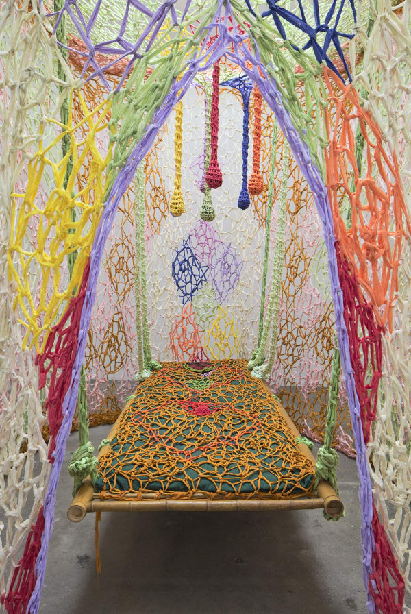 Ernesto Neto installation with healing bed