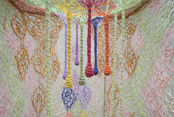 Ernesto Neto installation with healing bed
