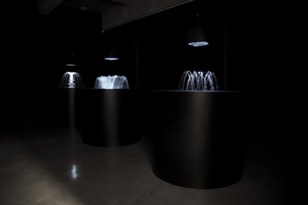 image of Eliasson "volcanos" made of water and light flashing
