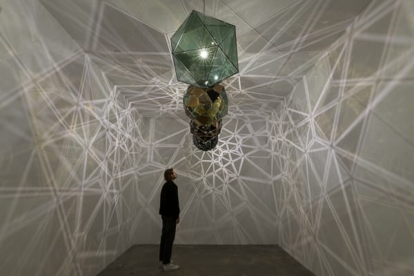 image of eliasson,lamp installation in dark room