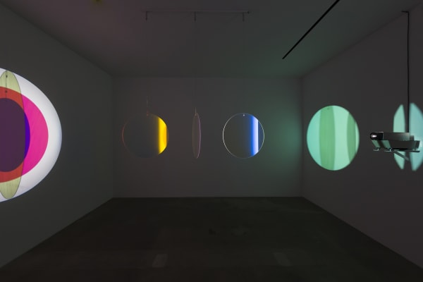 image of eliasson, lens flare installation in dark room