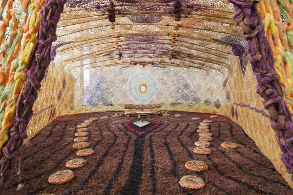 inside Ernesto Neto crochet installation