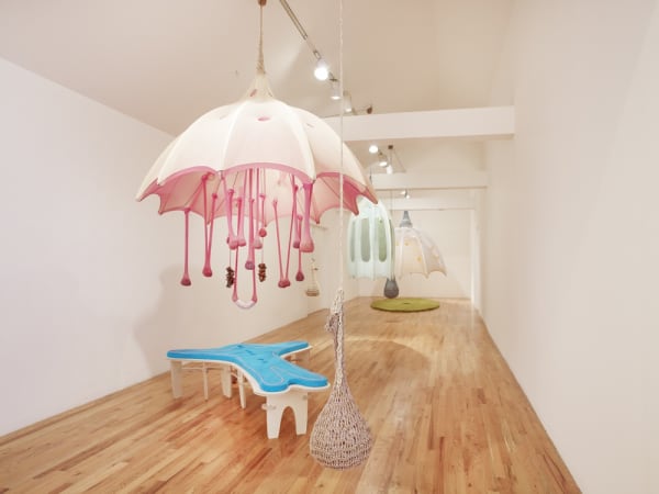 Ernesto Neto installation at the Aspen Art Museum, umbrella with a bed