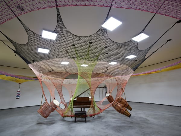 Crochet ceiling installation with instruments