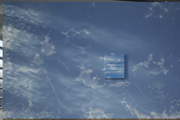 Installation view of blue mural and paintings