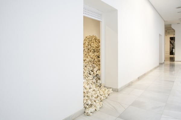 entrance to room filled with paper