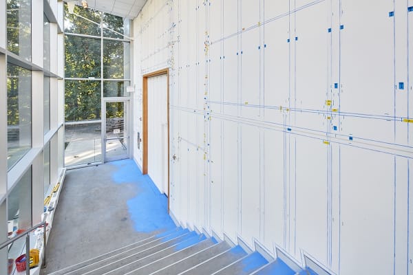 blue chaulk lines on wall