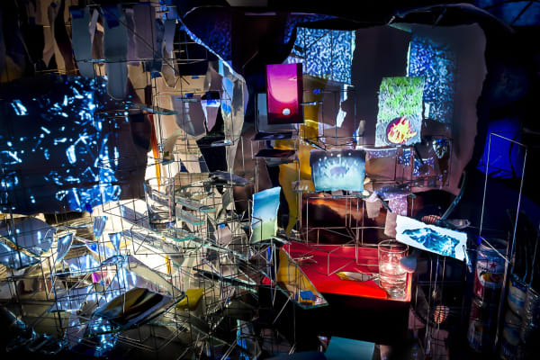 Sarah Sze installation, projections on a desk