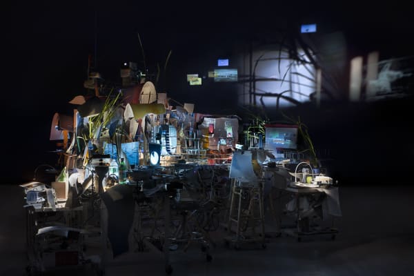 Sarah Sze installation, projections on a desk
