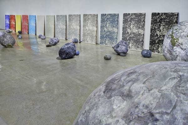 Installation view with mirrors and rocks