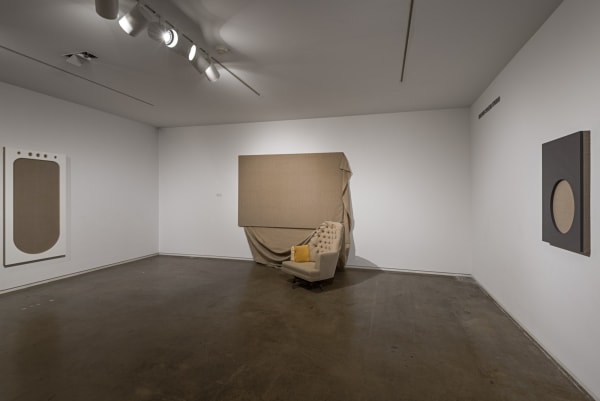 Image of a series of sculpture with a chair