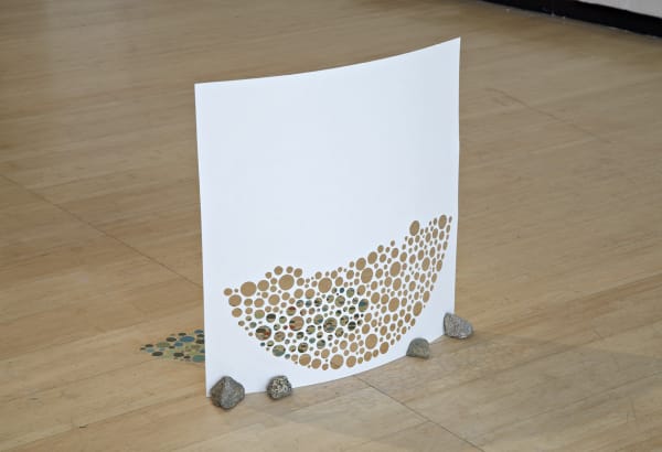 image of a paper sculpture on the floor
