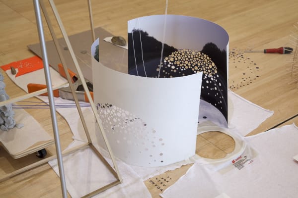 Image of a sculpture of objects on the floor