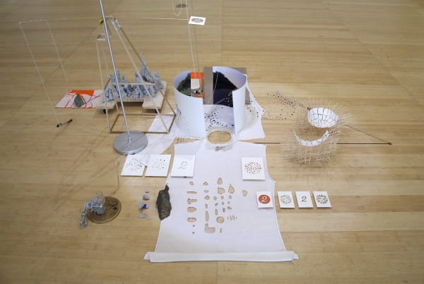 Image of a sculpture of objects on the floor