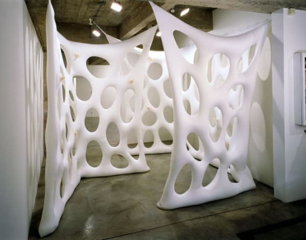 fabric walls lining the gallery