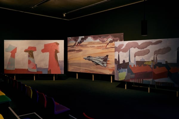 Image of Phil Collins installation with video stills