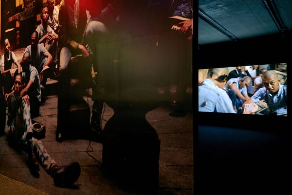 Image of Phil Collins installation with video still