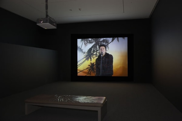 Installation view of Phil Collins video