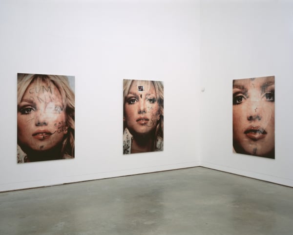 Image of an installation view of Phil Collins photographs