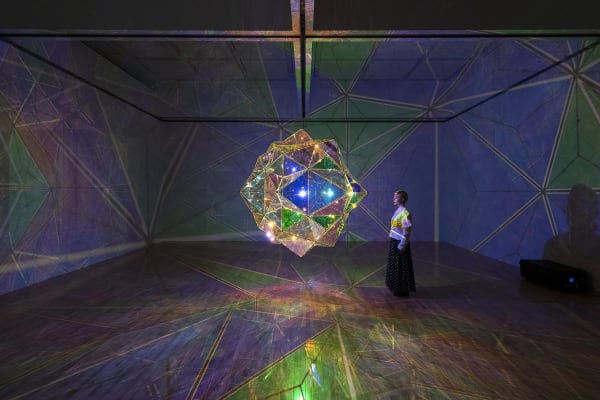 image of eliasson, lamp in dark room installation