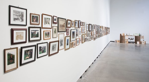Image of Mark Dion exhibition, men in game photo series