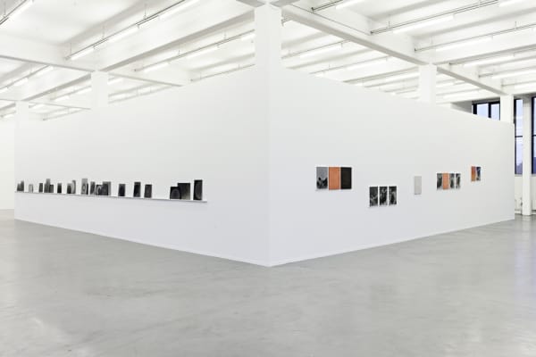 Image of Lisa Oppenheim photographs installation with smoke series