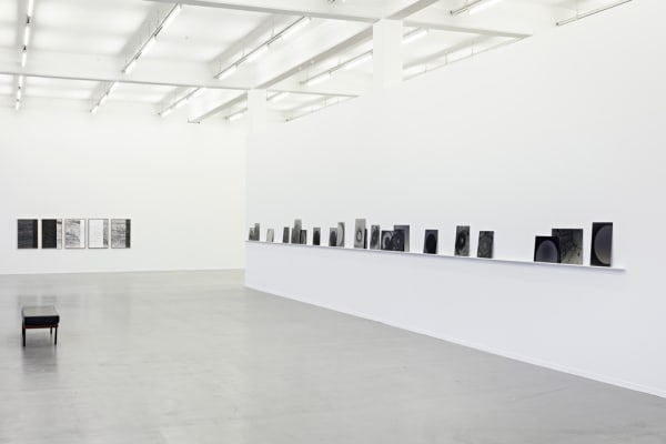 Image of Lisa Oppenheim photographs installation of moons