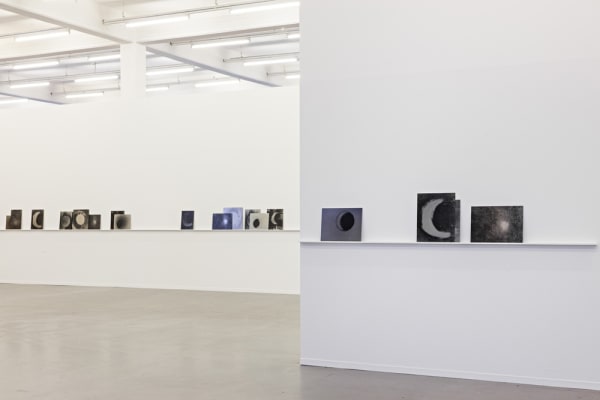 Image of Lisa Oppenheim photographs installation of moons