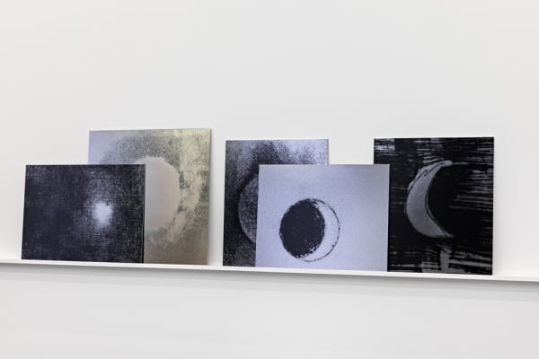 Image of Lisa Oppenheim photographs installation of moons