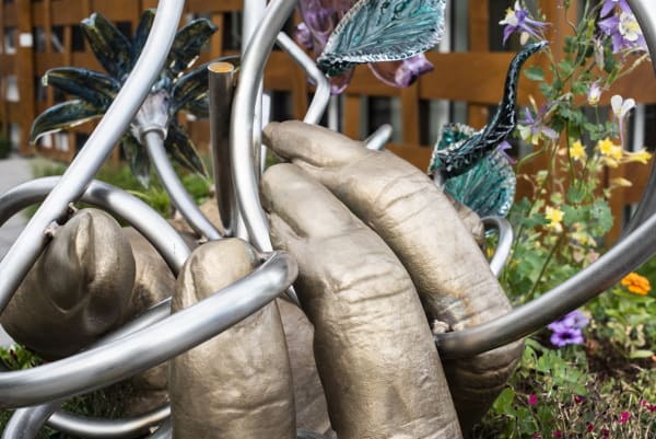 detail of bronze fingers
