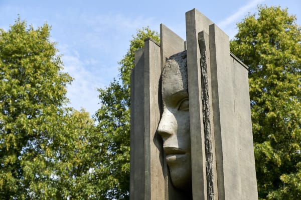 image of Mark Manders large bronze sculpture of figures in garden