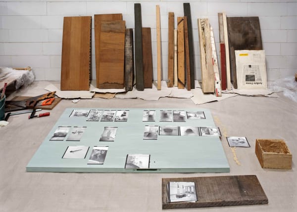 image of mark manders sculptures and studio set up inside a concrete room block