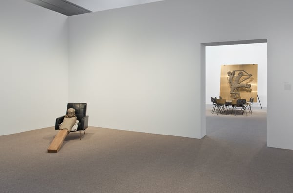 Image of Mark Manders sculpture leaning clay figure