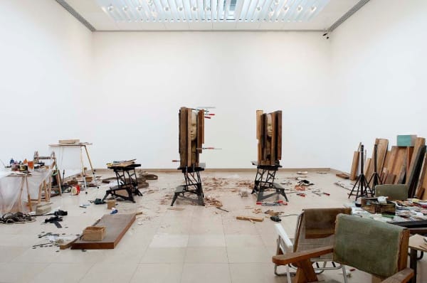 image of Mark Manders head sculptures in a studio environment