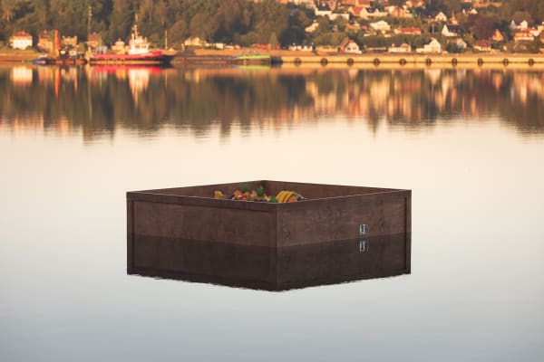 image of a crate floating in the river