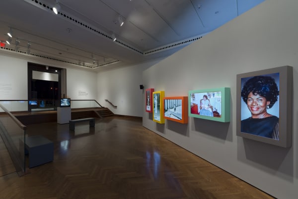 Image of Wearing installation, moving photographs in a row