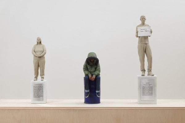 Installation view of Gillian Wearing at Whitechapel Gallery, London, sculpture of three people
