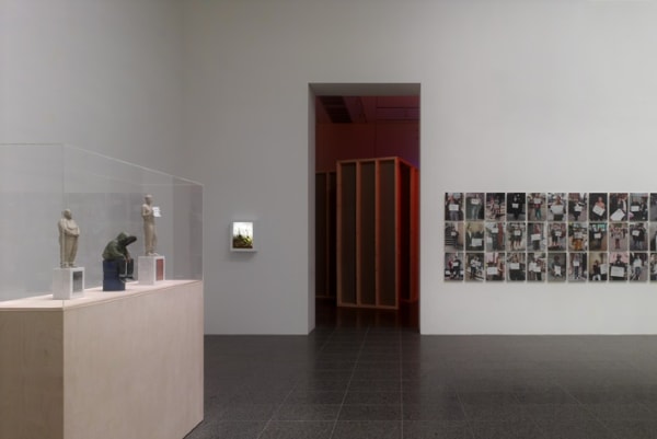 image of Gillian Wearing photographs in grid and sculptures