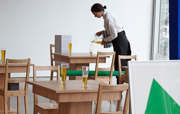image of Laura Lima sculptural installation, objects drinking at a "bar"