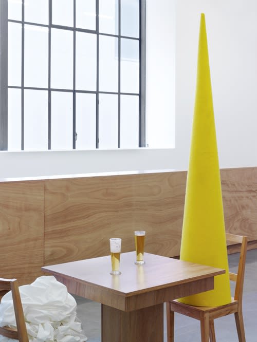 image of Laura Lima sculptural installation, objects drinking at a "bar"