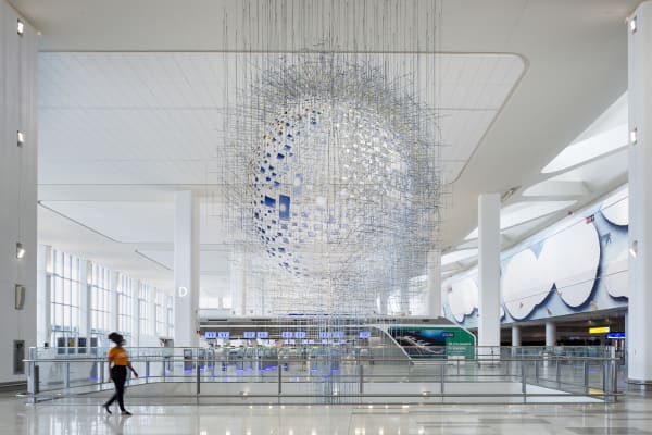 image of large Sarah Sze installation - small photos of the sun arranged in a sphere