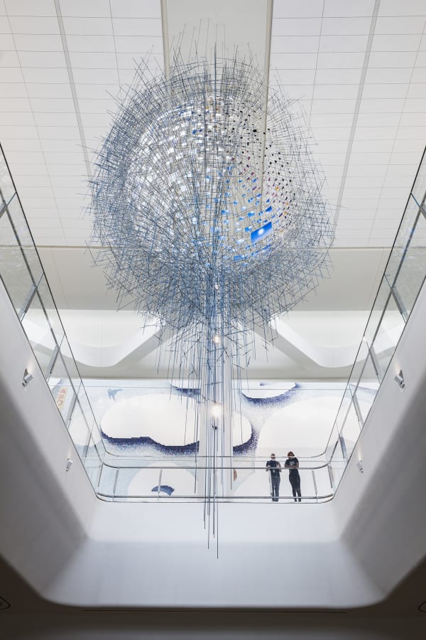 image of large Sarah Sze installation - small photos of the sun arranged in a sphere