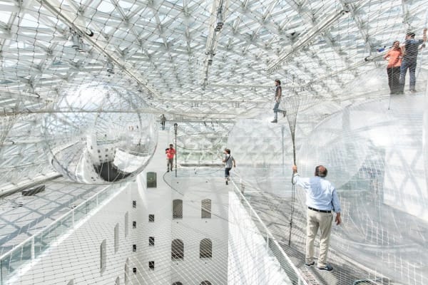 image of Saraceno hanging nets with people walking on them