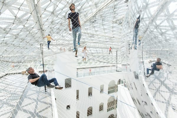 image of Saraceno hanging nets with people walking on them