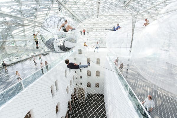 image of Saraceno hanging nets with people walking on them